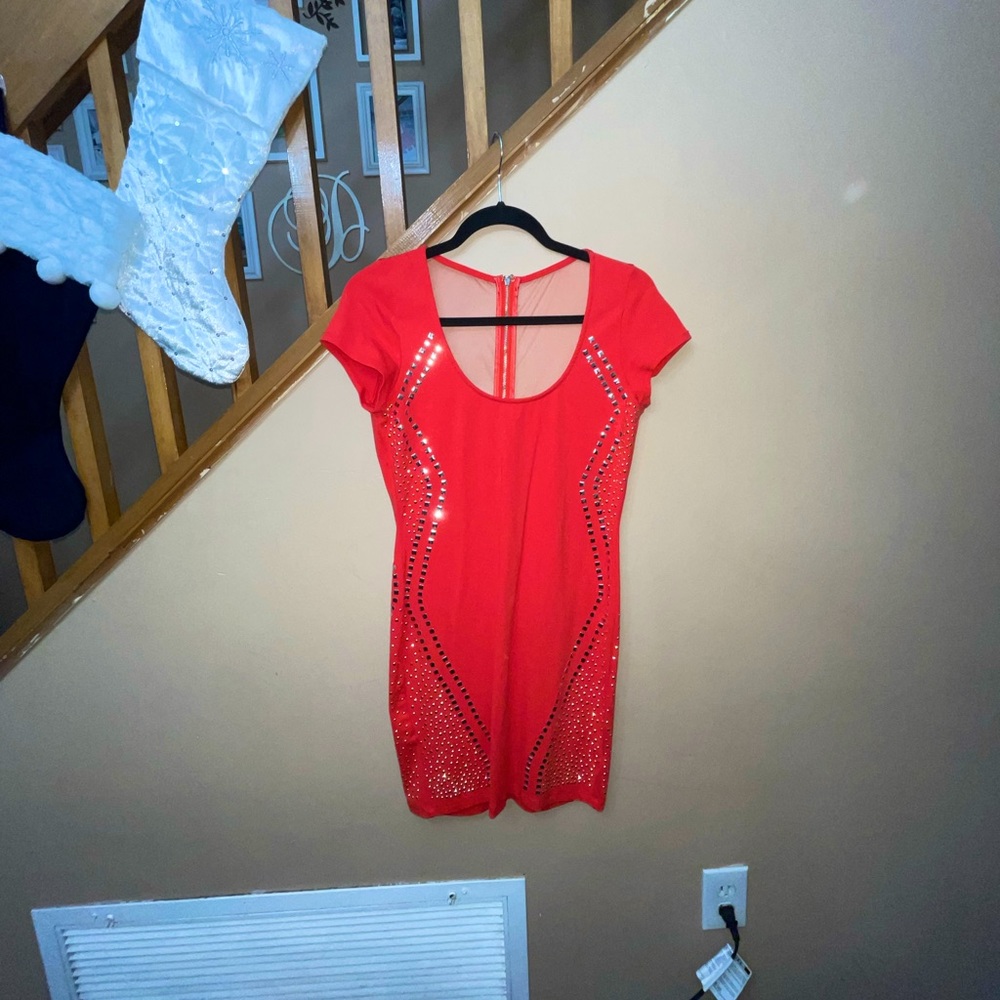 Very sexy red studded dress. Bebe, Sz L, red lycra. Silver and gold studs.